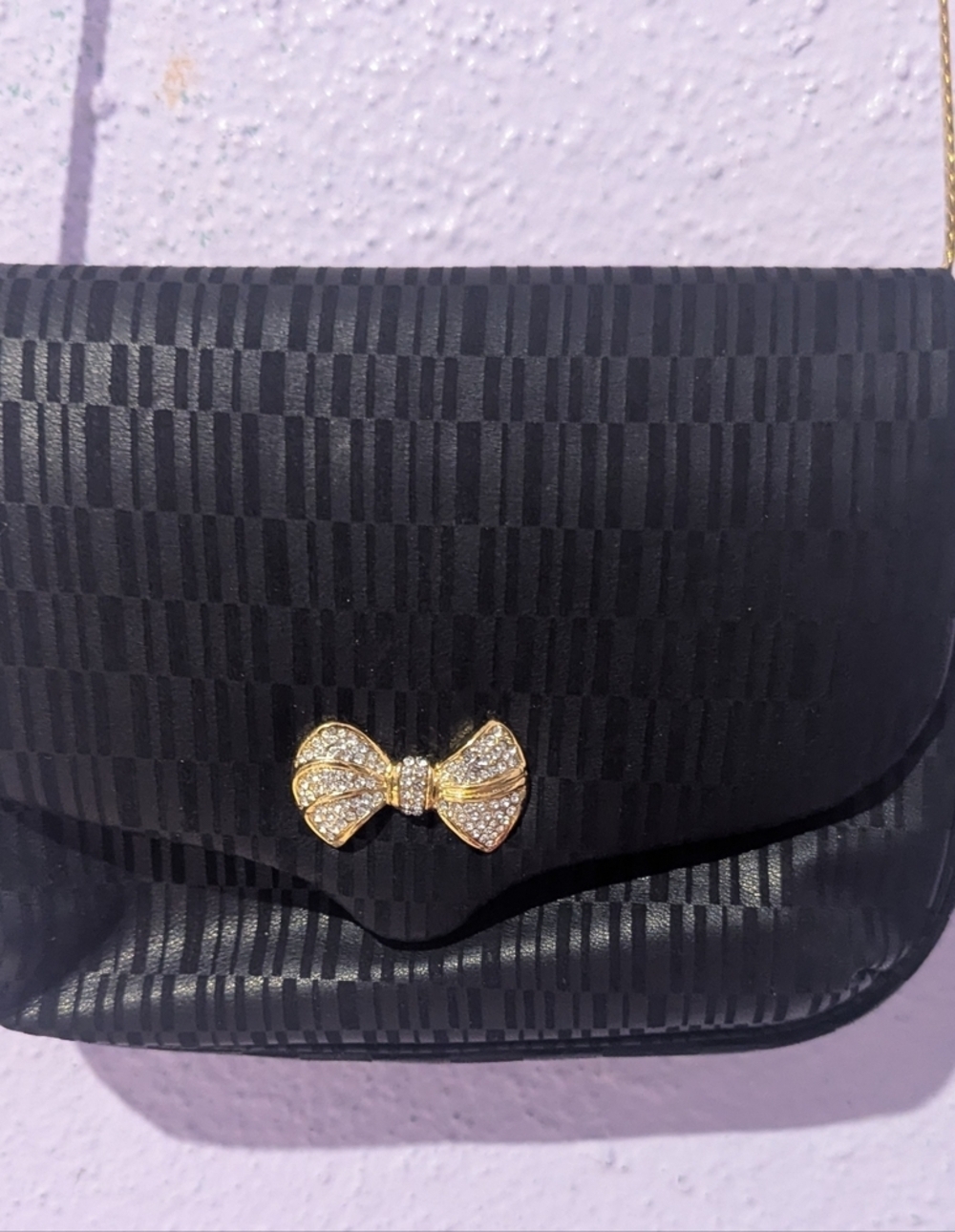 Sold Ashneil. Elegant Black Bow Accent Women's Bag